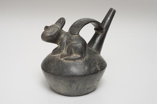 vessel with spout and dog figure